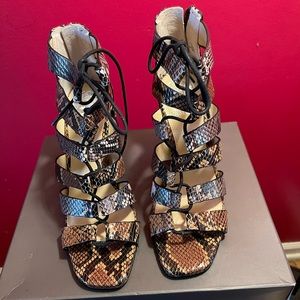 Snake skin heeled sandal with tie
